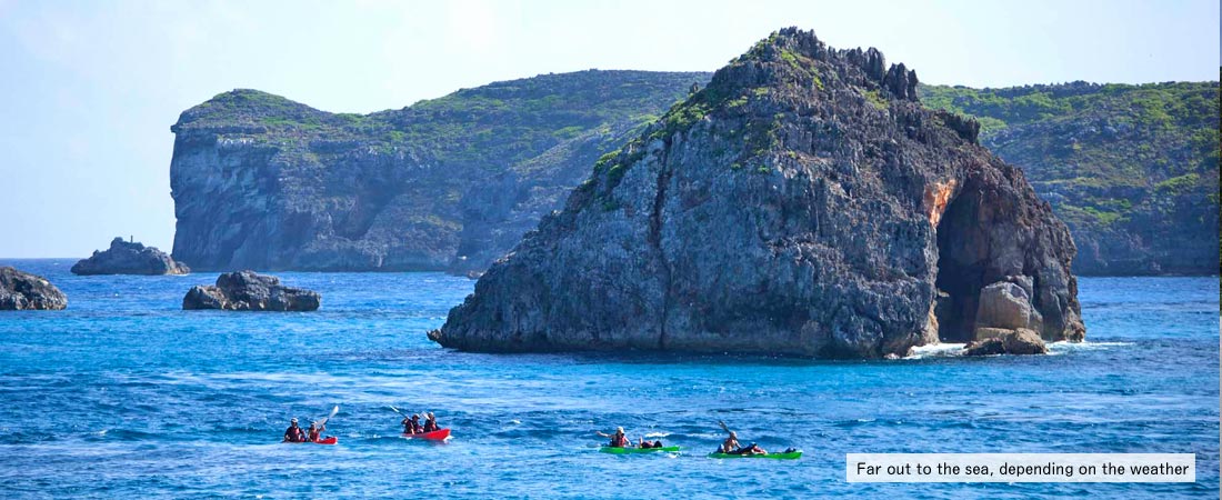 Far out to the sea. Sea kayaking can be very effective and fun exercises, and very eco-friendly transport around Ogasawara islands.